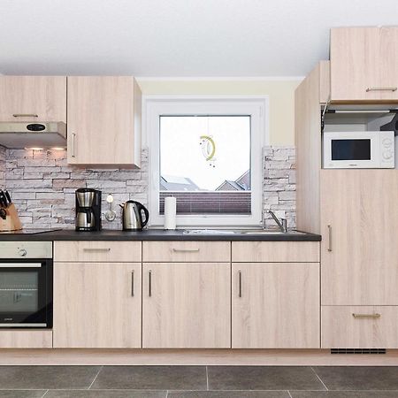 Ferienwohnung Teezeit นอยฮาร์ลิงเงอซีล ภายนอก รูปภาพ